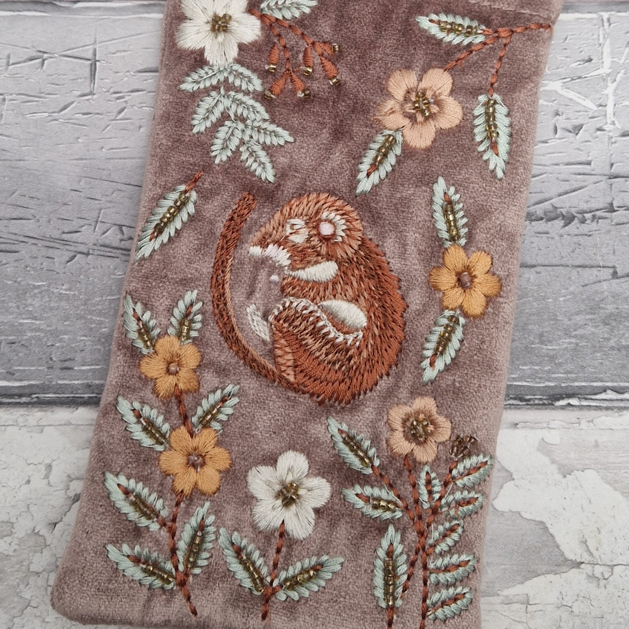 Buff velvet glasses case decorated with an embroidered Sleeping Dormouse. Finished with beads.