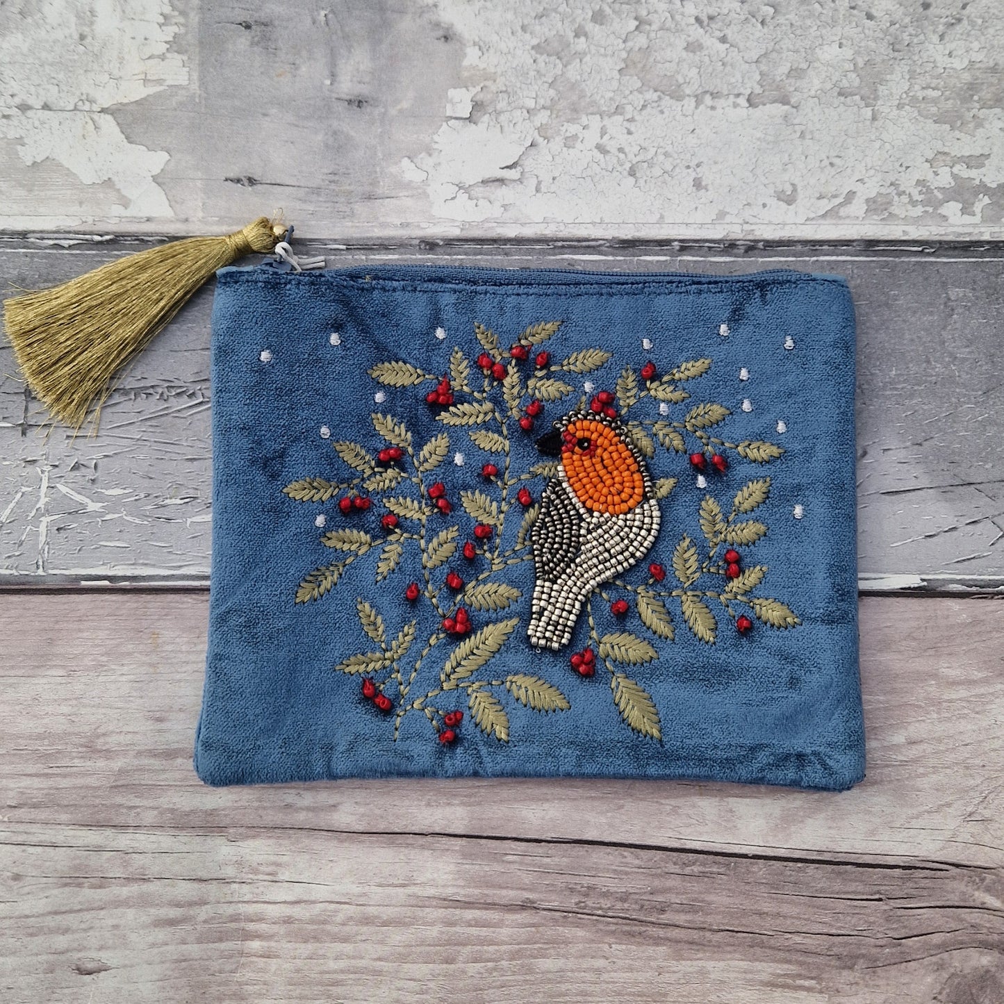 Dusky Blue Velvet Make up Bag decorated with an embroidery and bead design featuring a Robin surrounded by festive holly.