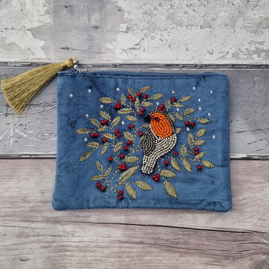 Dusky Blue Velvet Make up Bag decorated with an embroidery and bead design featuring a Robin surrounded by festive holly.
