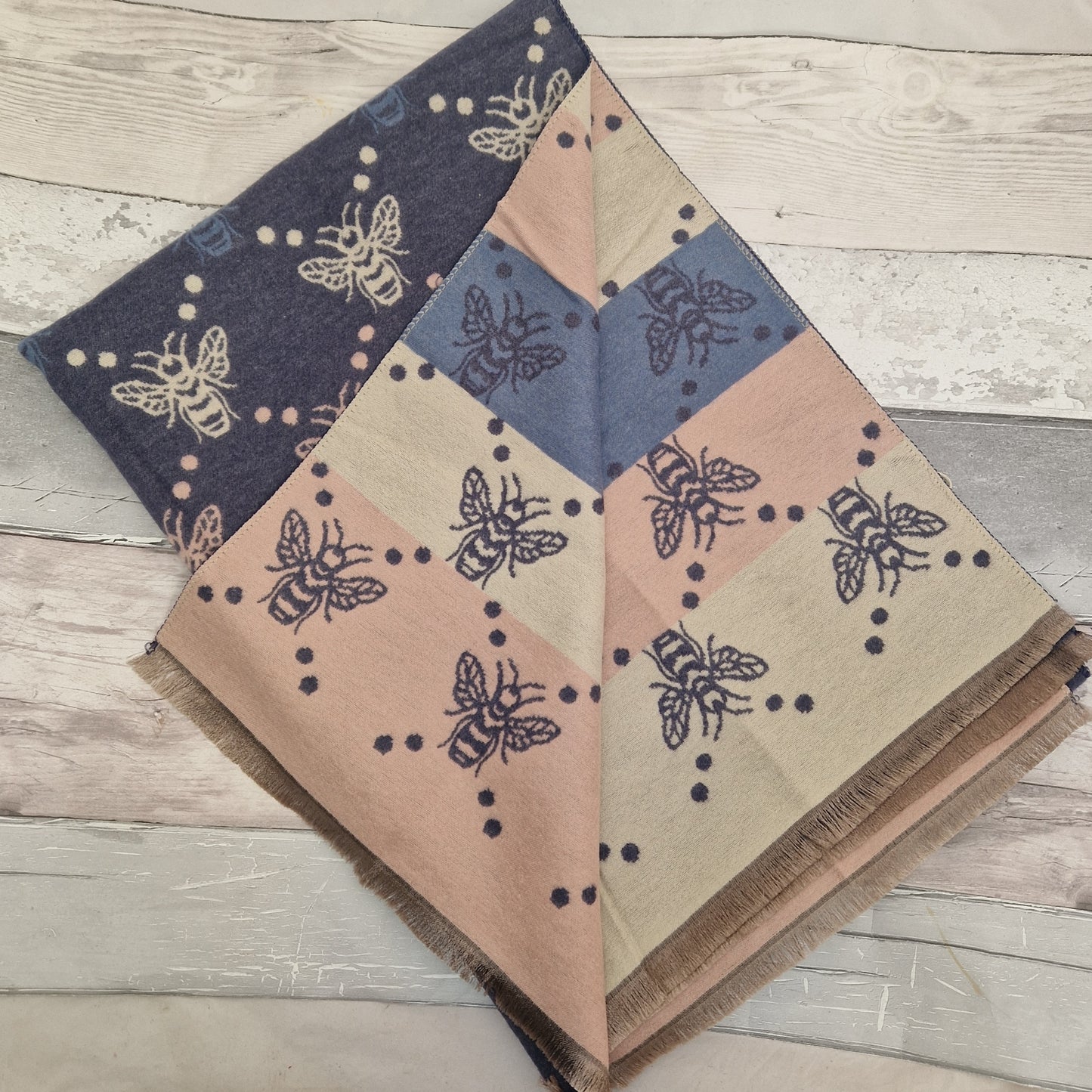 Reversible navy, blue, pink and cream scarf with a bee print design.