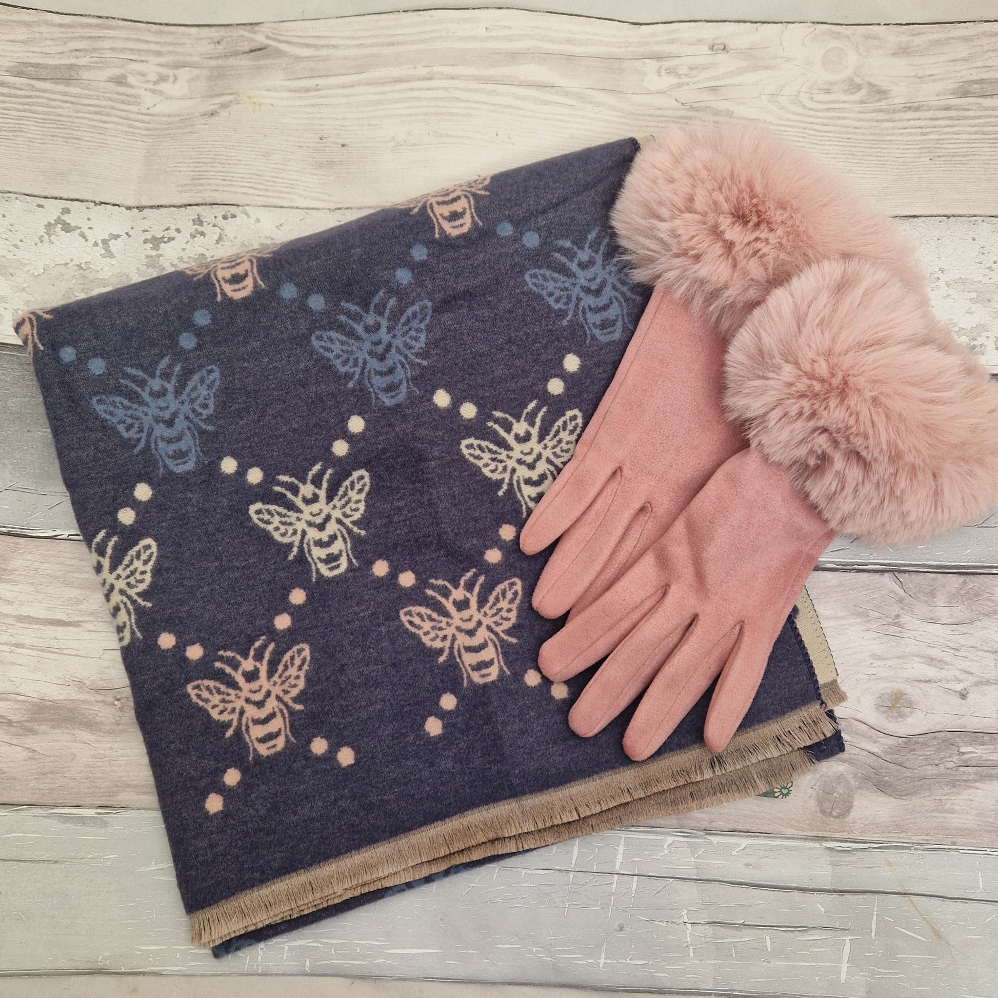 Navy Bee print design with pink faux fur gloves.