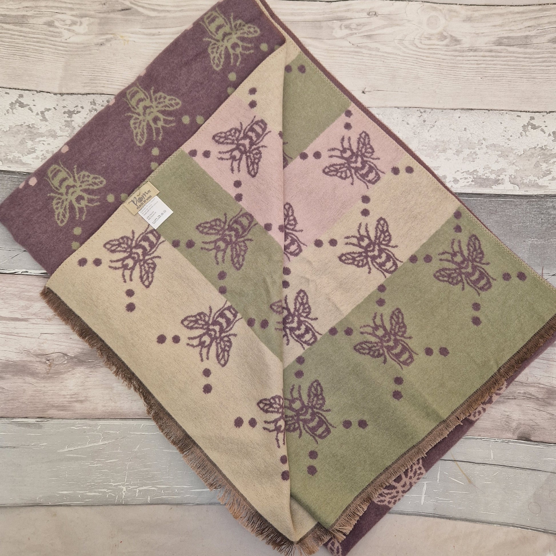 Reversible purple bee print scarf with accents of cream, pink and olive green.