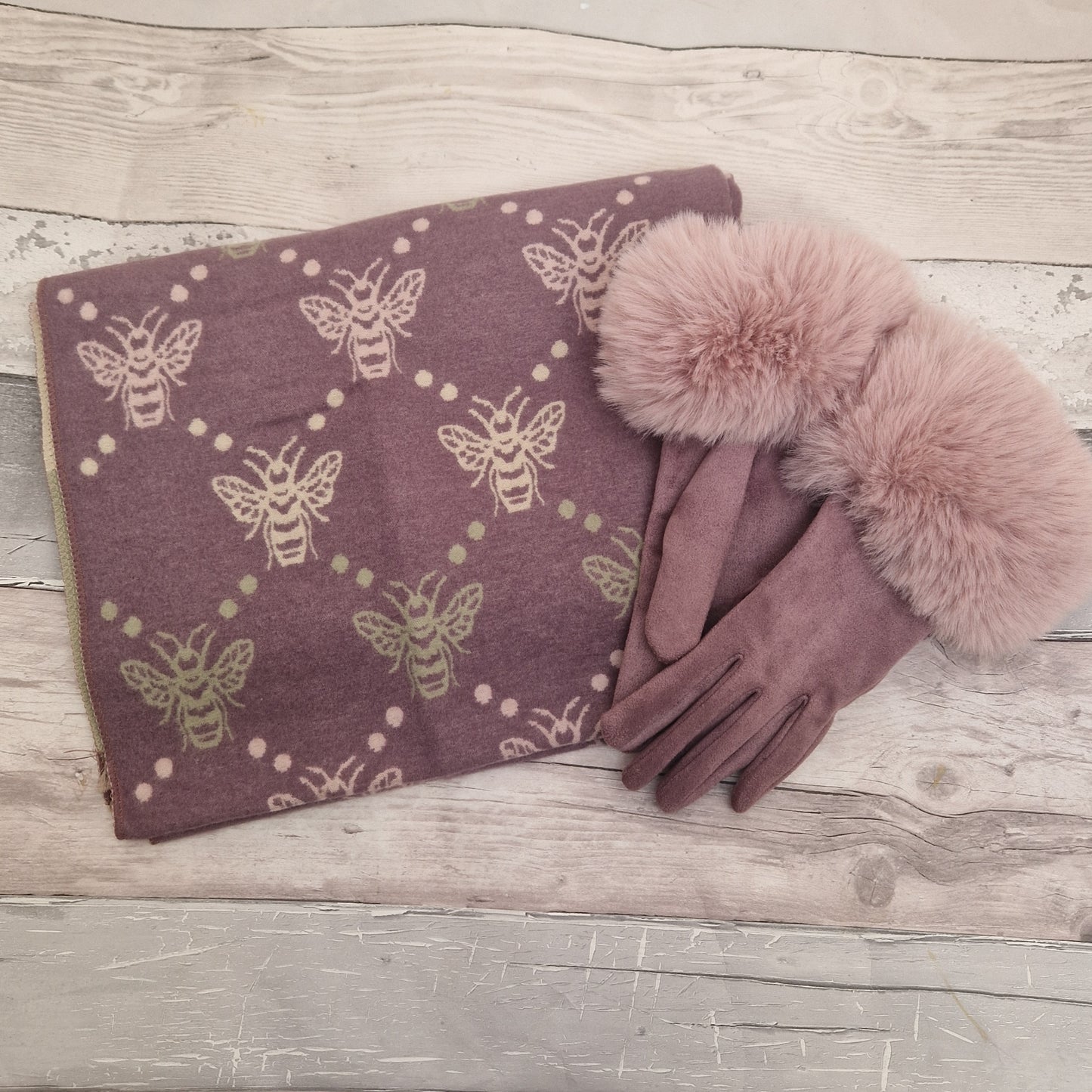 Purple bee print scarf with accents of cream, pink and olive green with matching gloves.