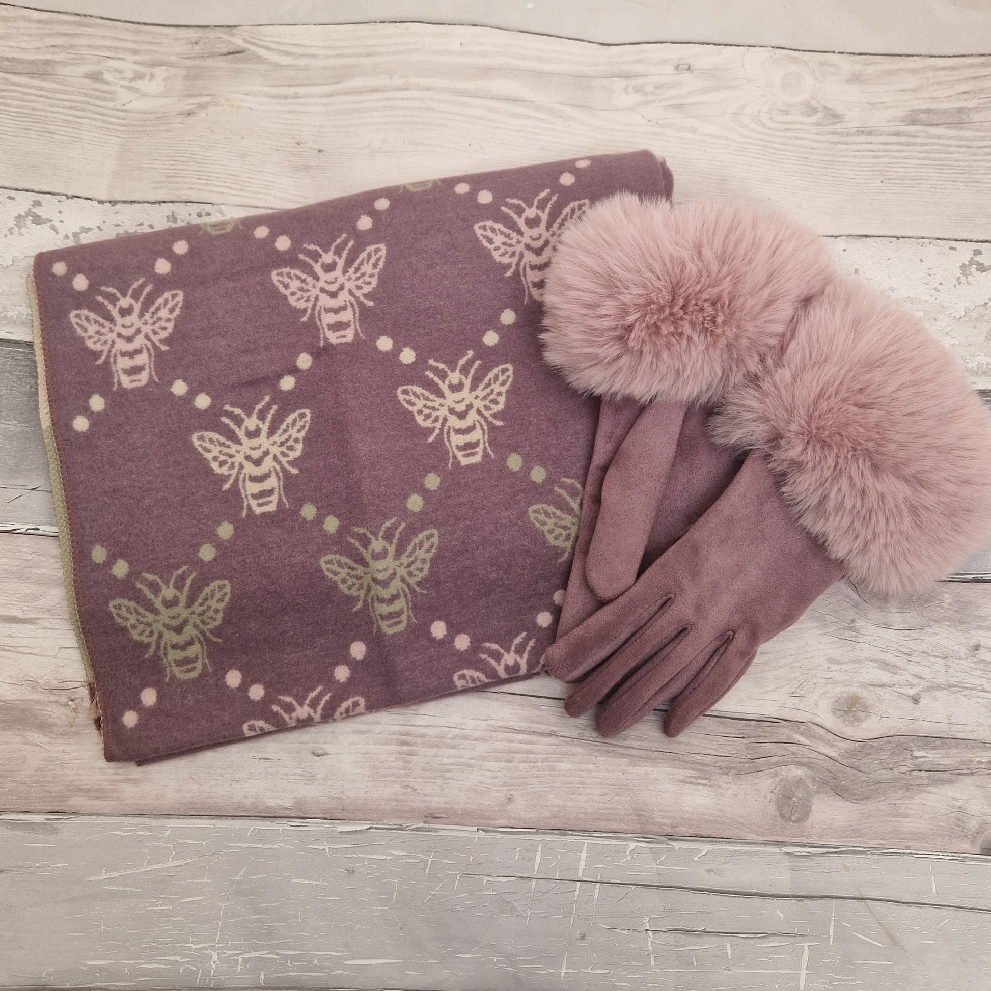 Purple bee print scarf with accents of cream, pink and olive green with matching gloves.