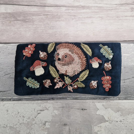 Velvet Jewellery Roll decorated with a hand embroidered image of a Woodland Hedgehog.