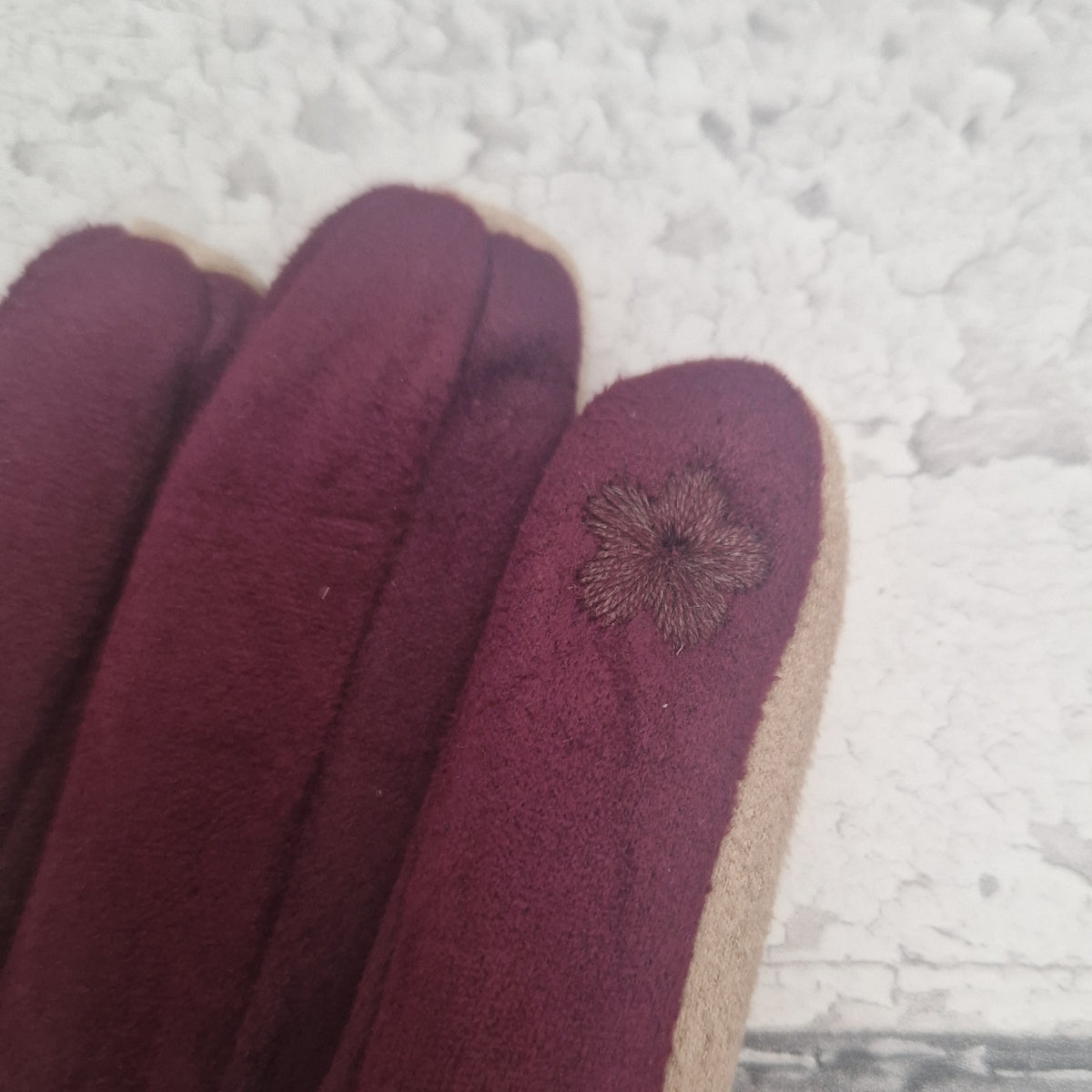 Touch screen finger point on glove.