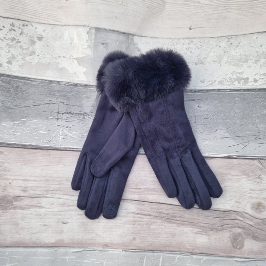 Navy coloured gloves with a faux fur trim and stitching detail down the back of the hand.