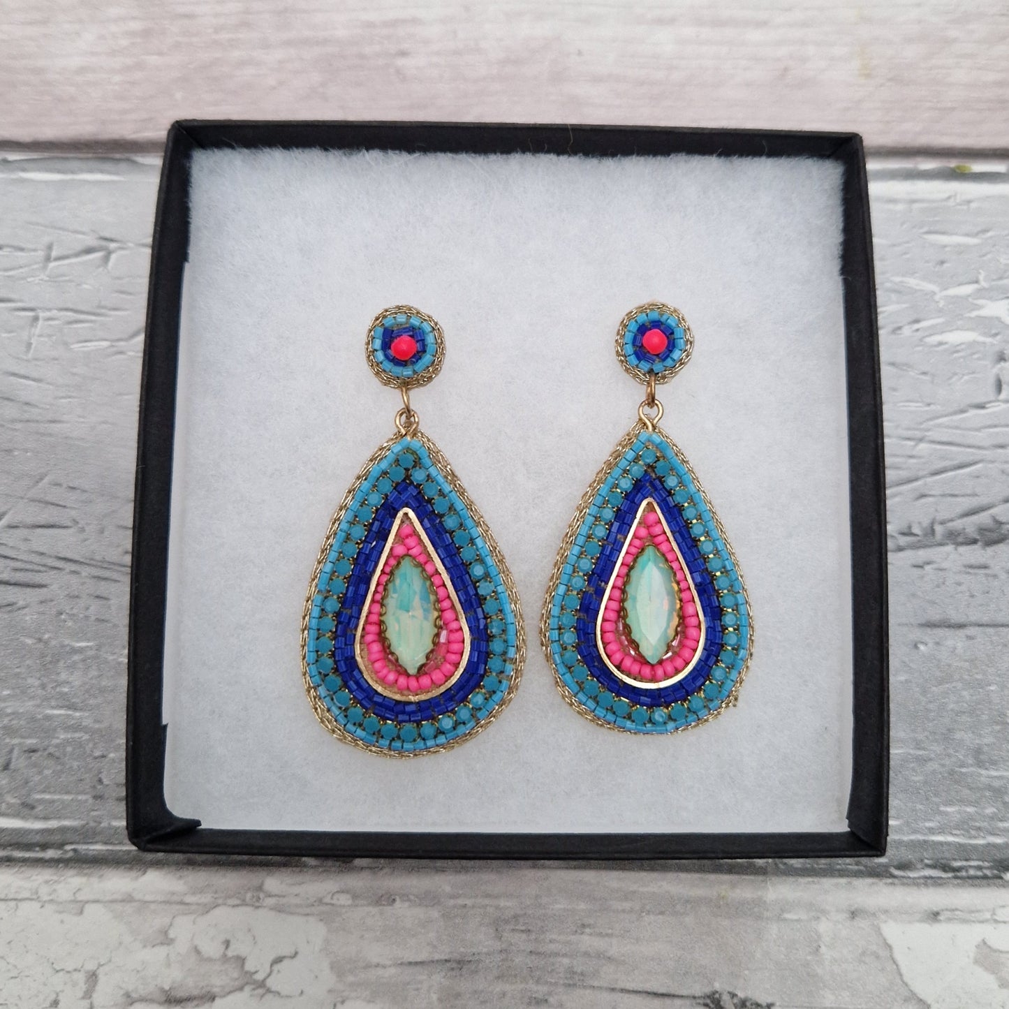 Pink and Blue Aztec inspired beaded drop earrings.