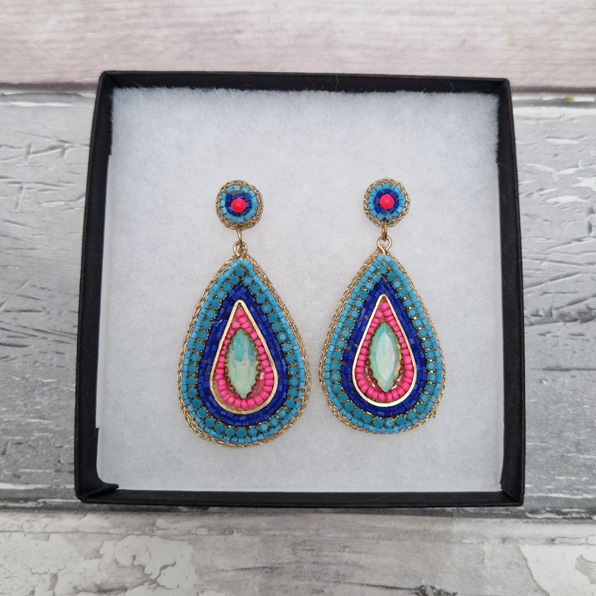 Pink and Blue Aztec inspired beaded drop earrings.