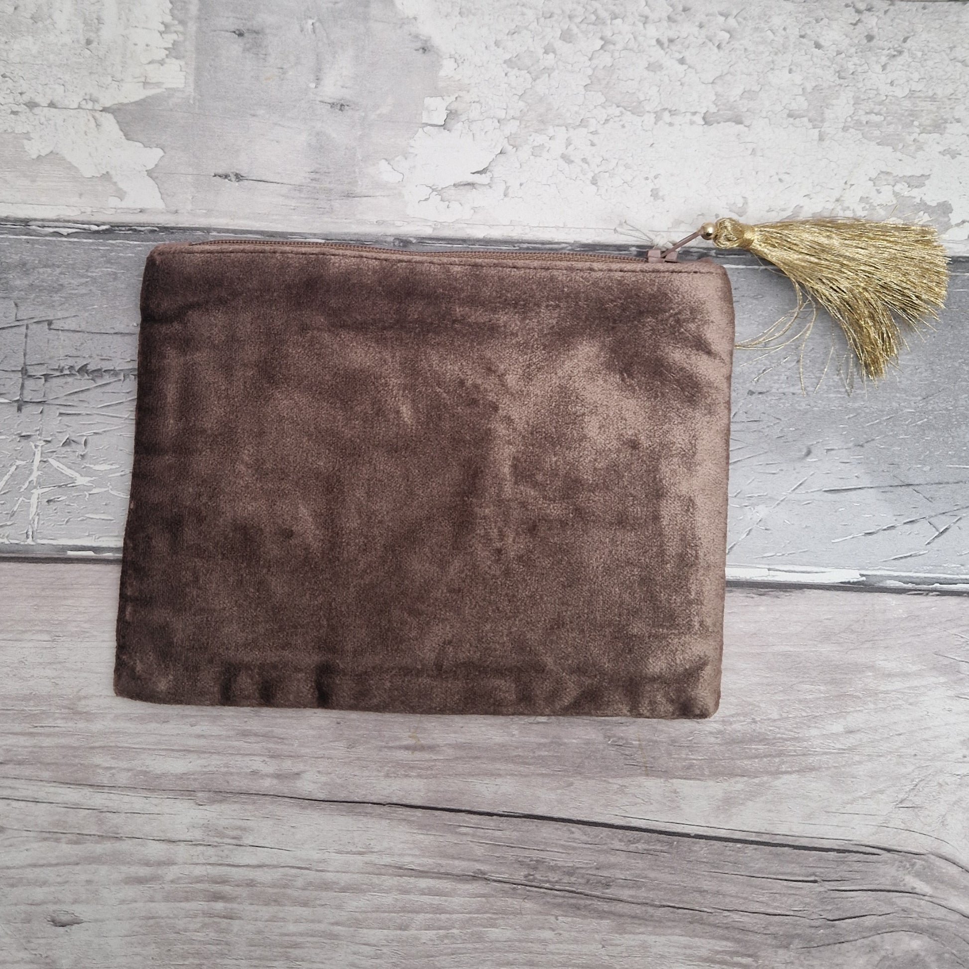 Rear view of brown velvet pouch.