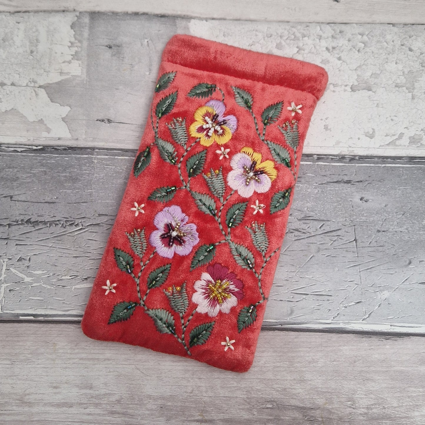 Salmon Pink Velvet glasses case decorated with embroidered purple and yellow pansies. Finished with intricately sewn beading.