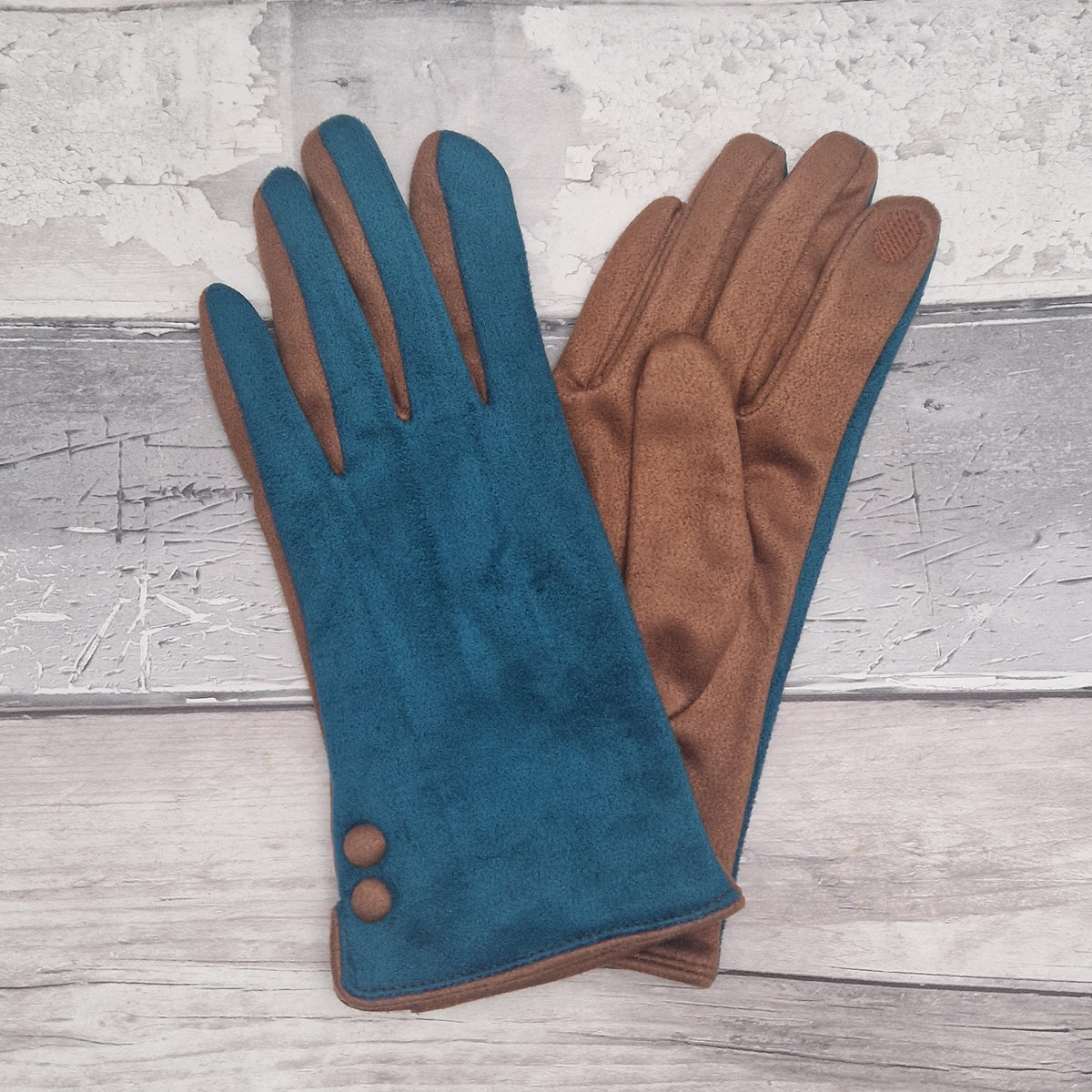Turquoise and cinnamon coloured gloves with cinnamon buttons.
