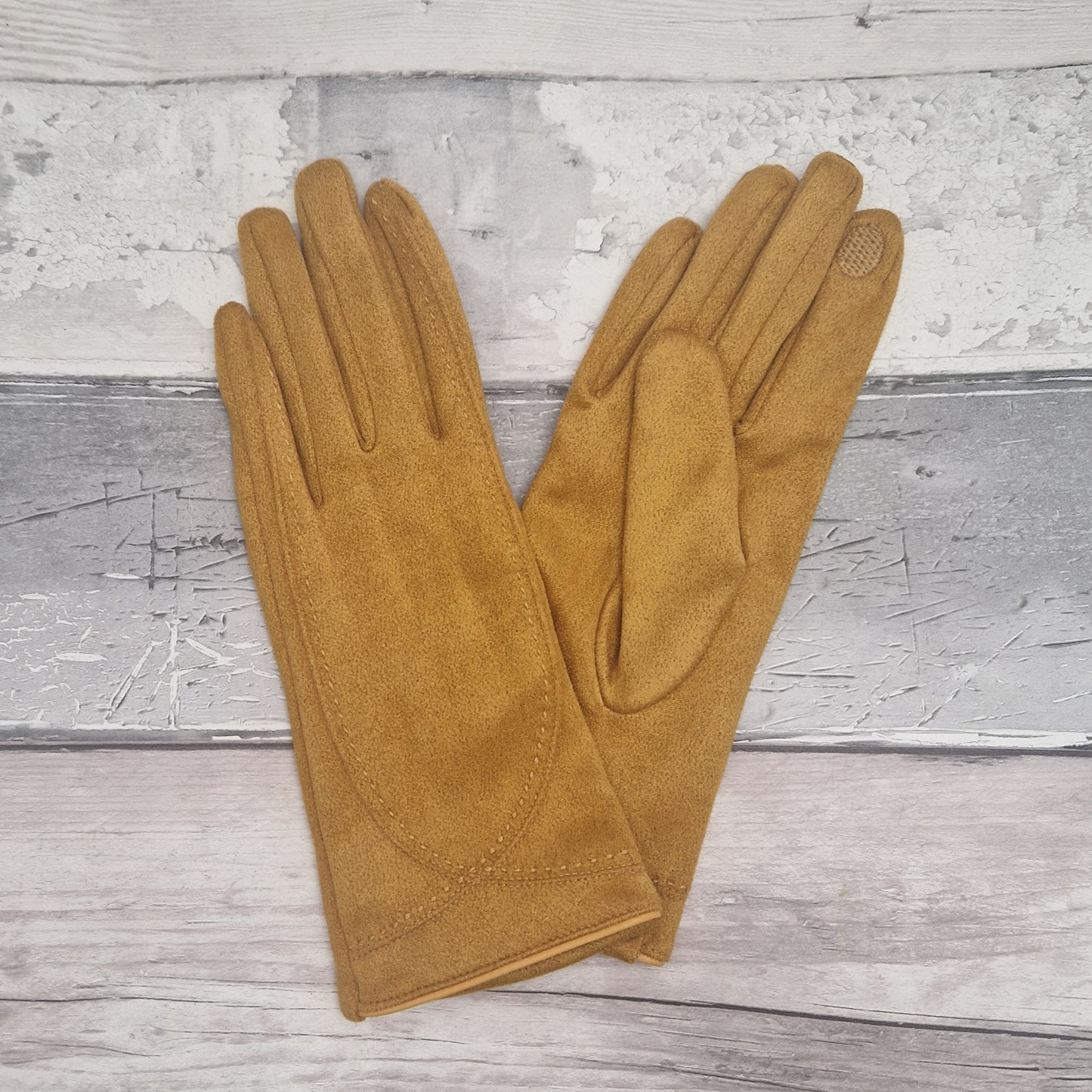 Mustard suede feel gloves.
