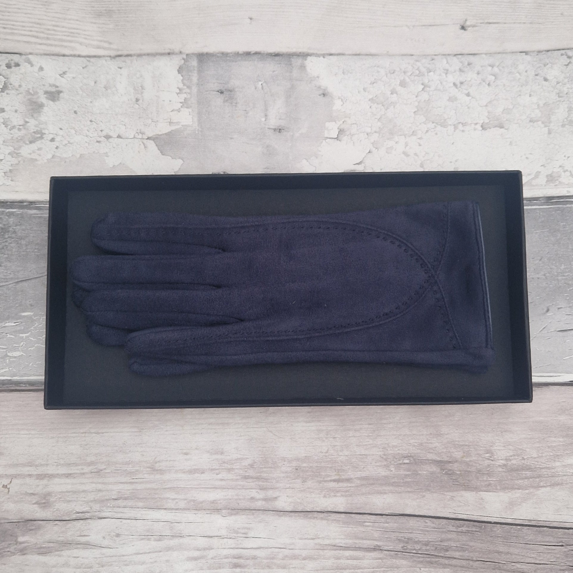 Navy Blue suede feel glove in a black presentation gift box.