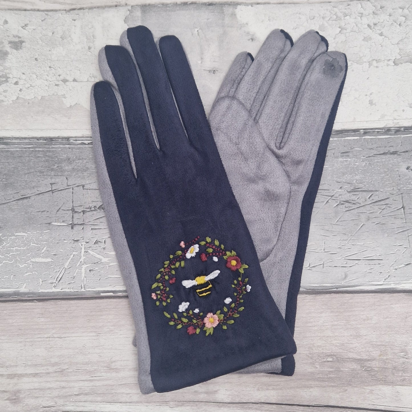 Grey and Navy two tone gloves with an embroidered bee design.
