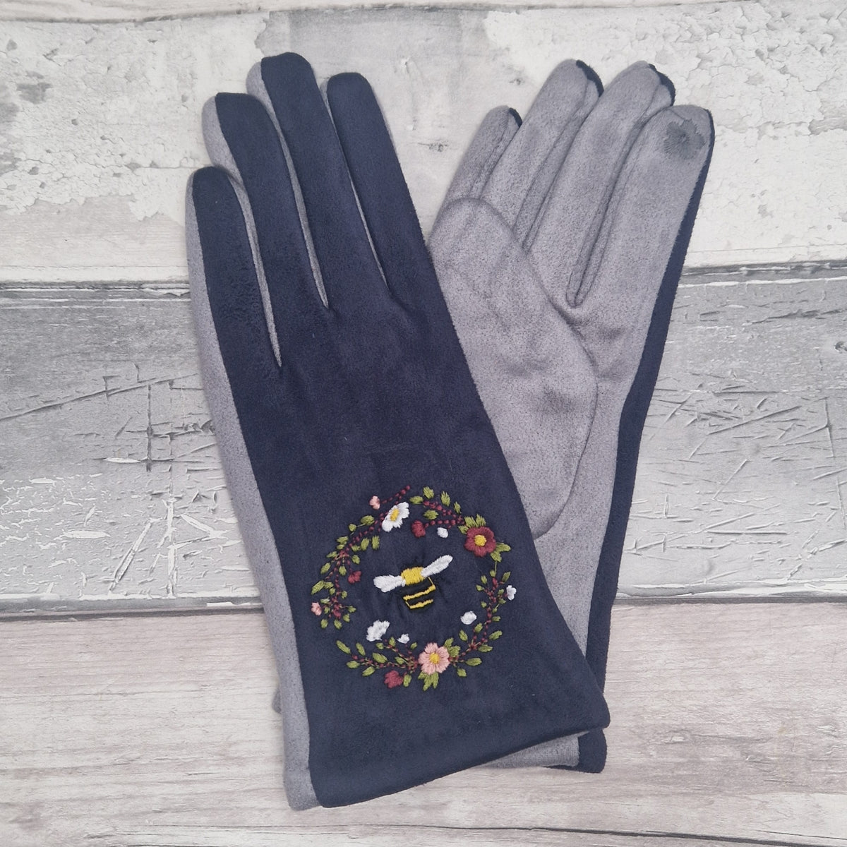 Grey and Navy two tone gloves with an embroidered bee design.