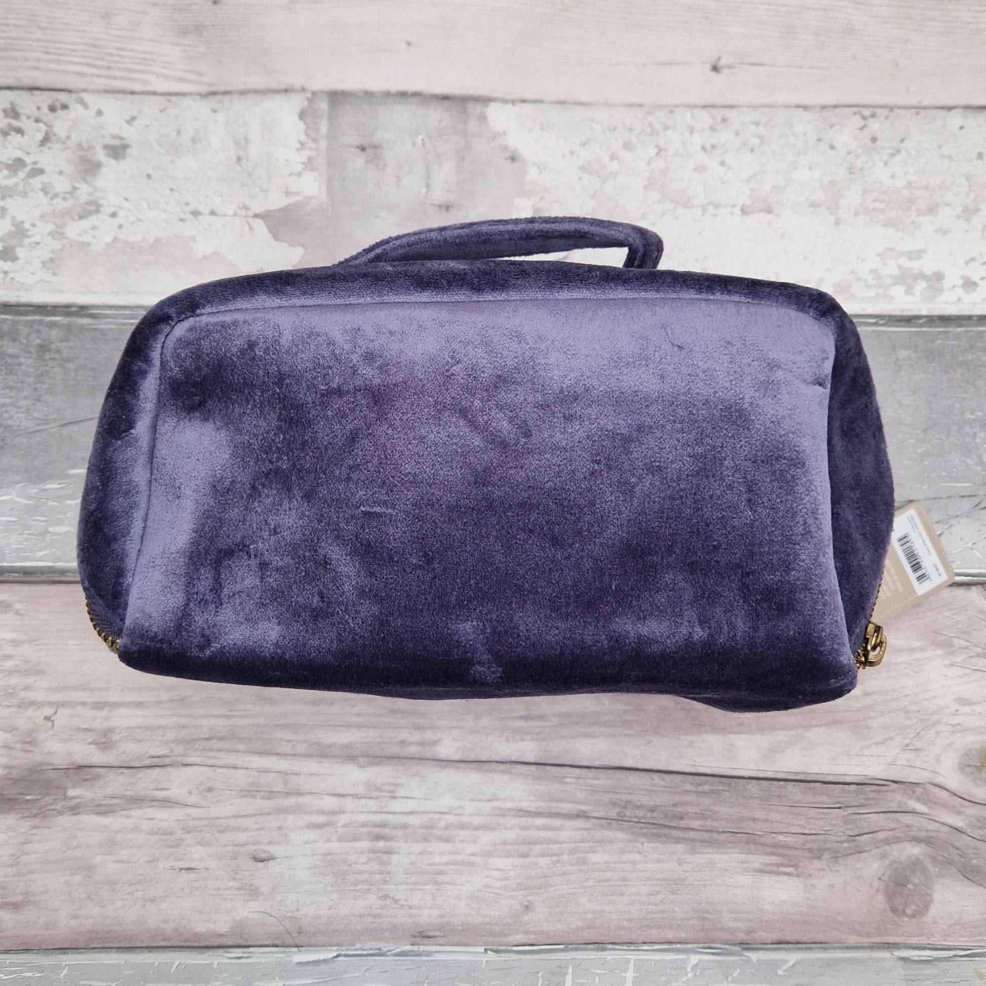 Back of purple velvet vanity case