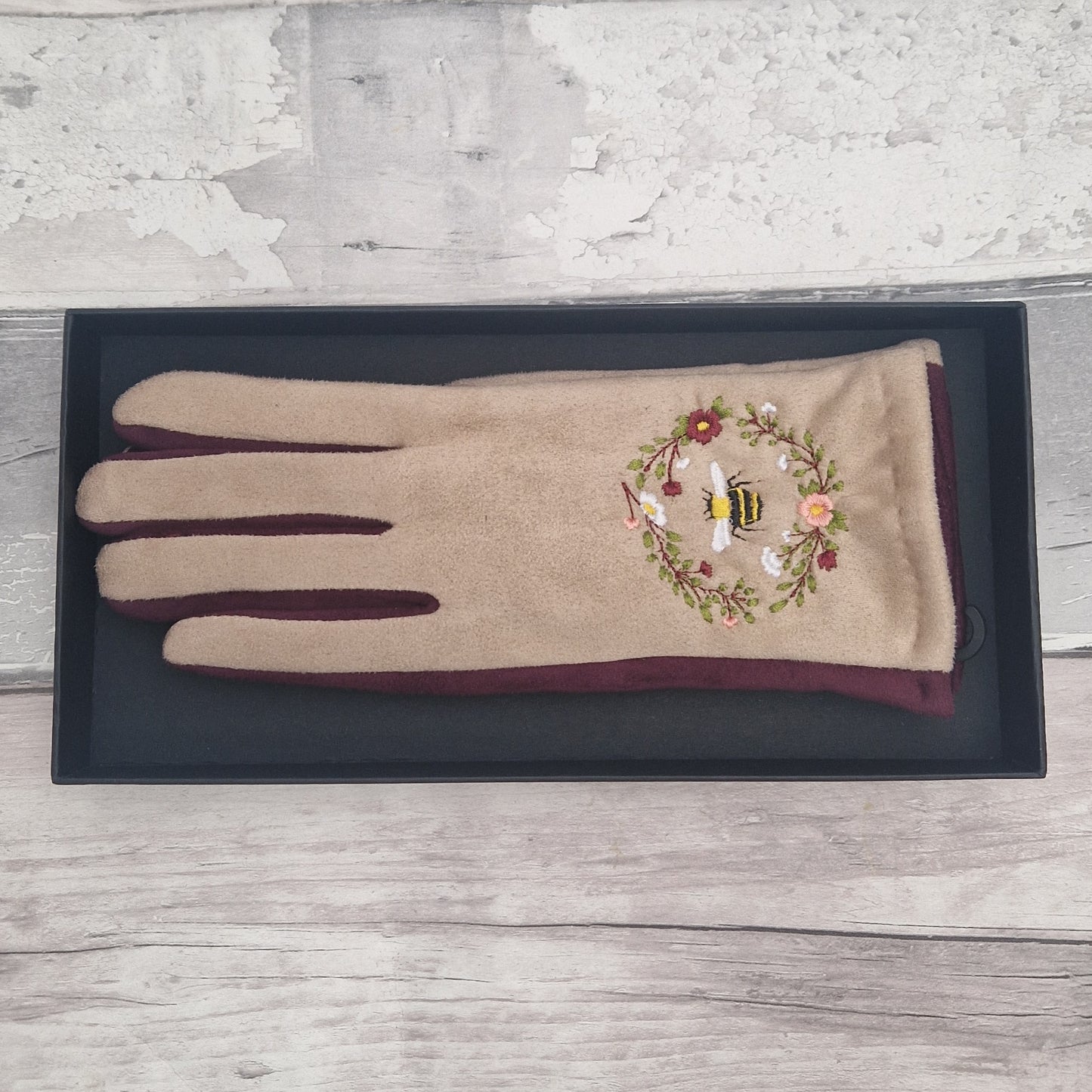 Grey and Navy two tone gloves with an embroidered bee design in a gift box.