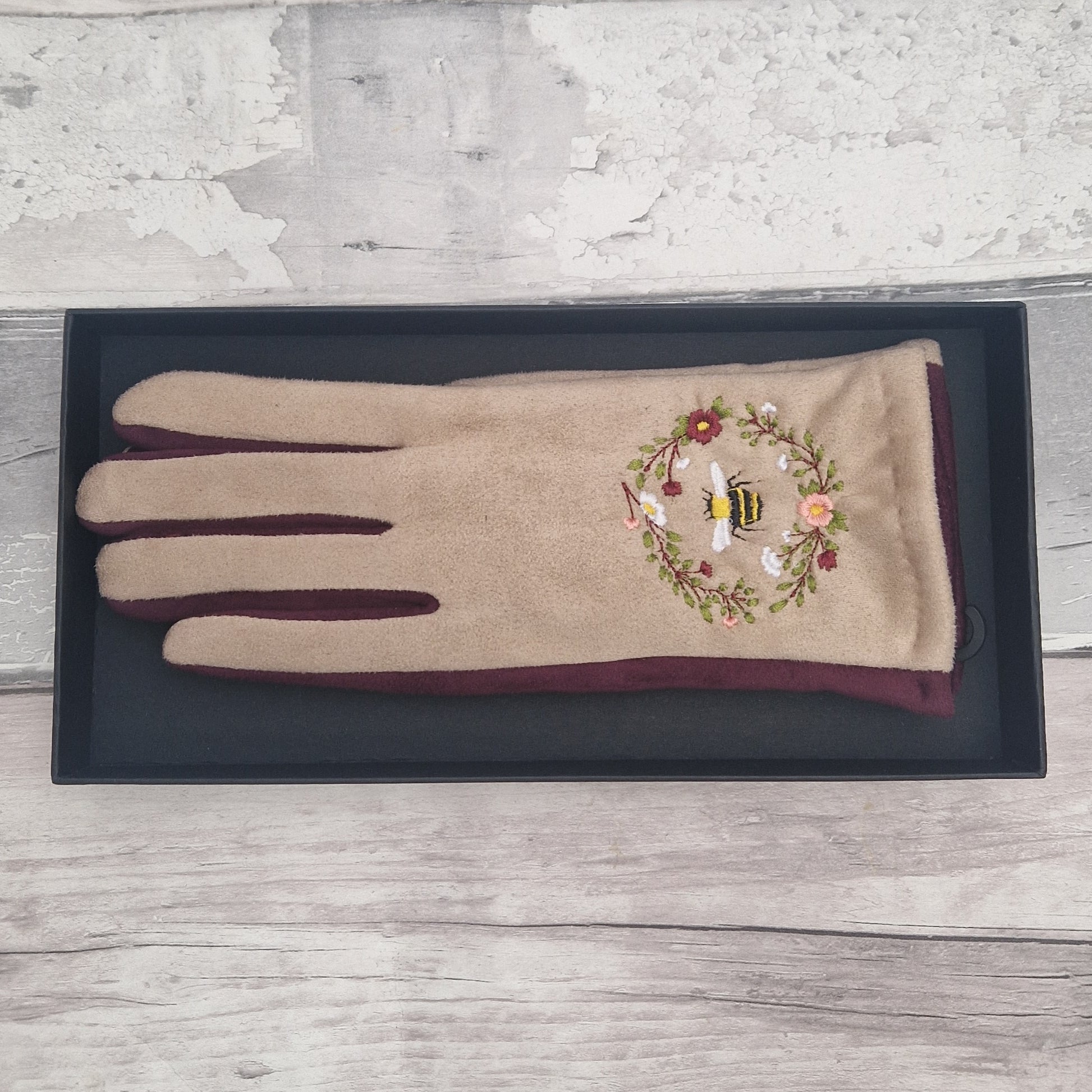 Grey and Navy two tone gloves with an embroidered bee design in a gift box.