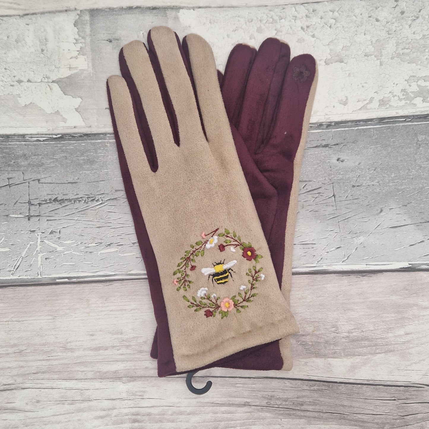 Camel and plum two tone gloves with an embroidered bee design.