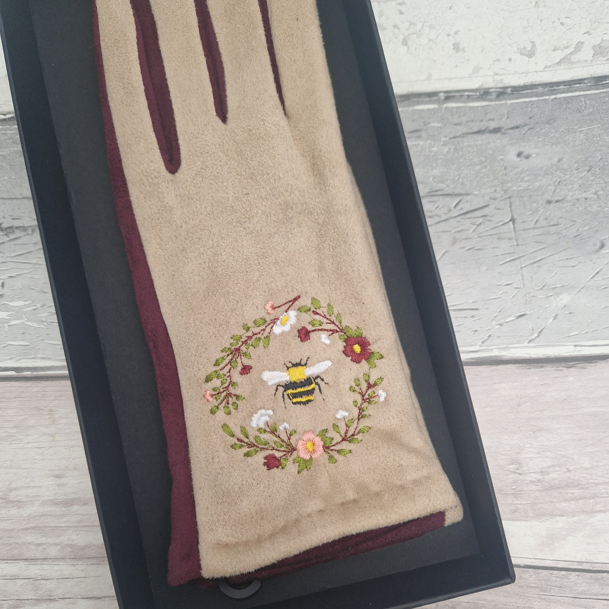 Grey and Navy two tone gloves with an embroidered bee design in gift box.