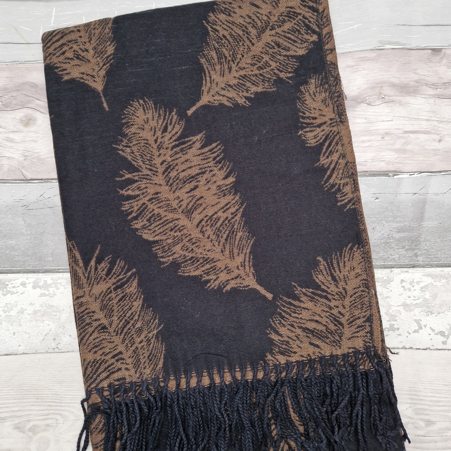 Black and brown feather print scarf.
