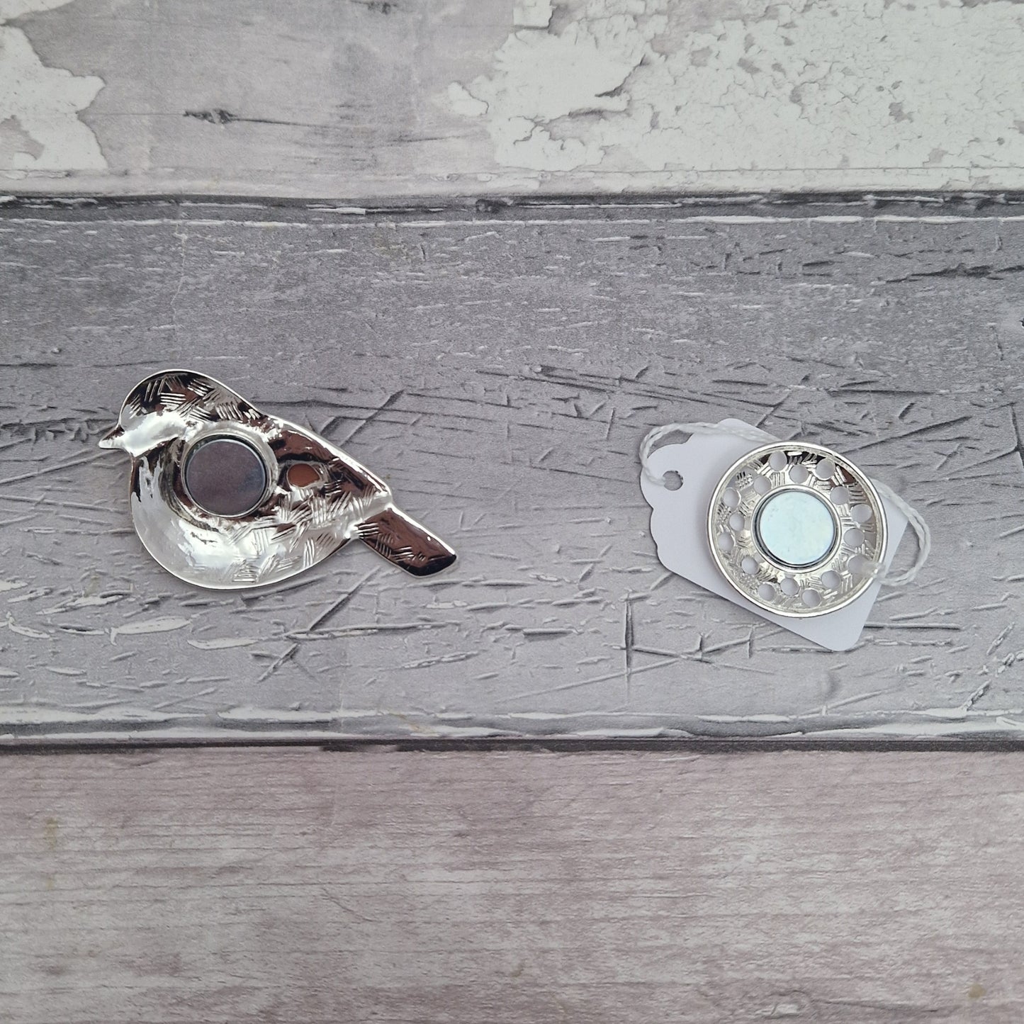 Reverse side of magnetic Robin brooch showing the magnets.