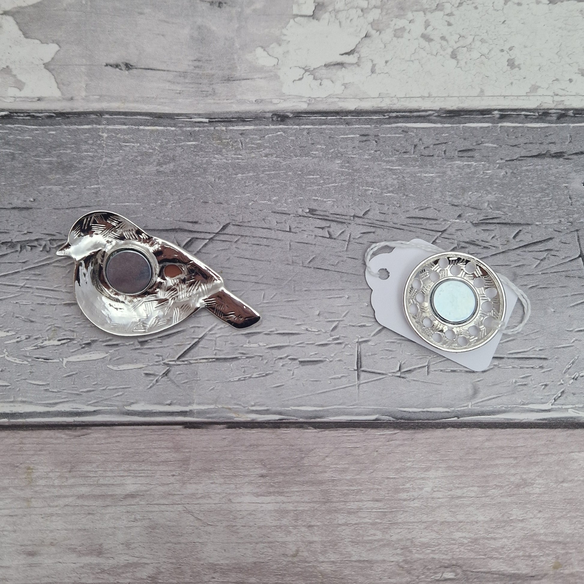 Reverse side of magnetic Robin brooch showing the magnets.