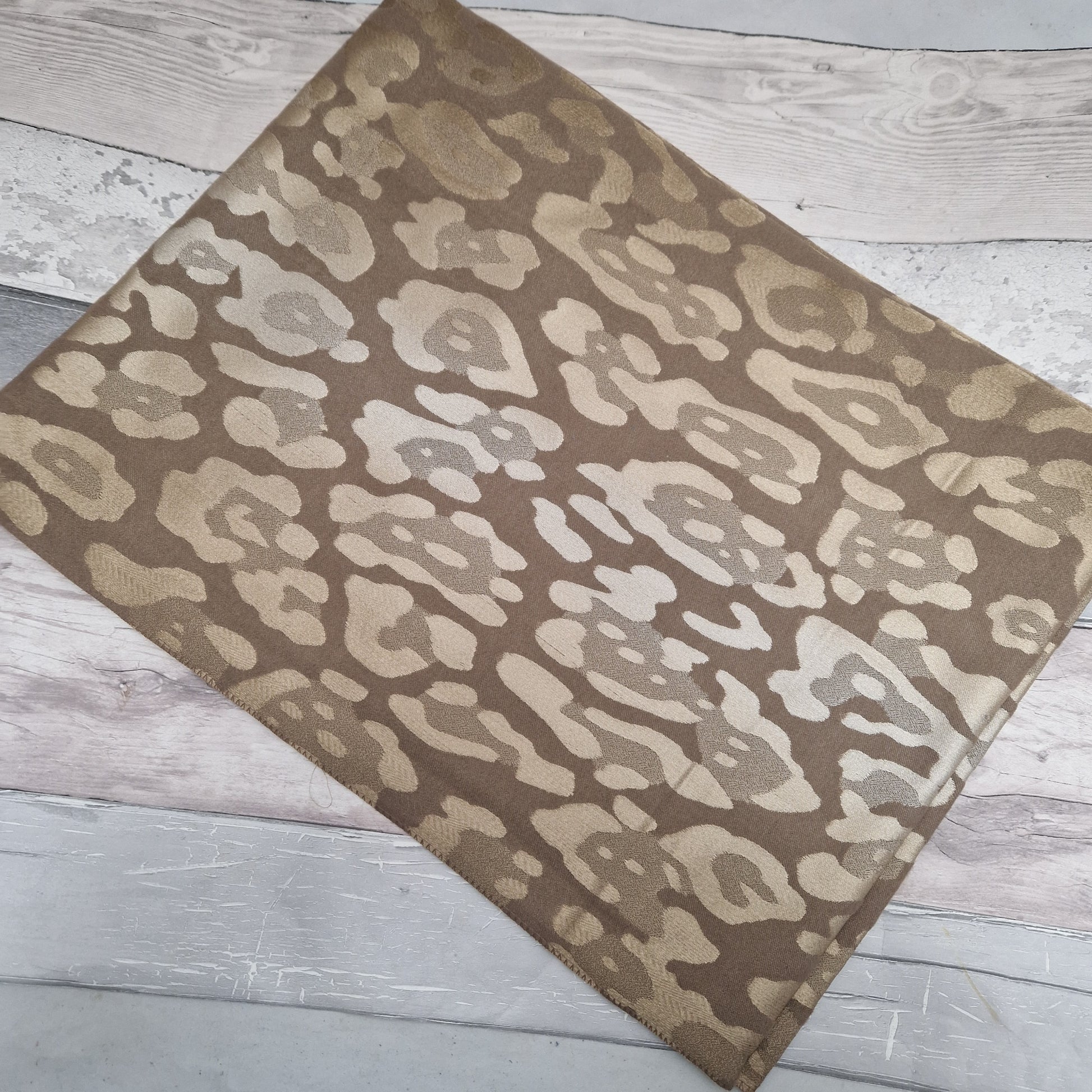 Shimmering Brown Leopard print scarf.