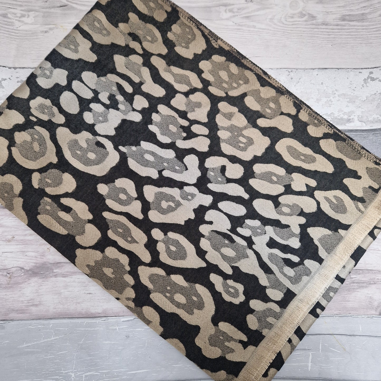 Shimmering Black and Gold Leopard print scarf.