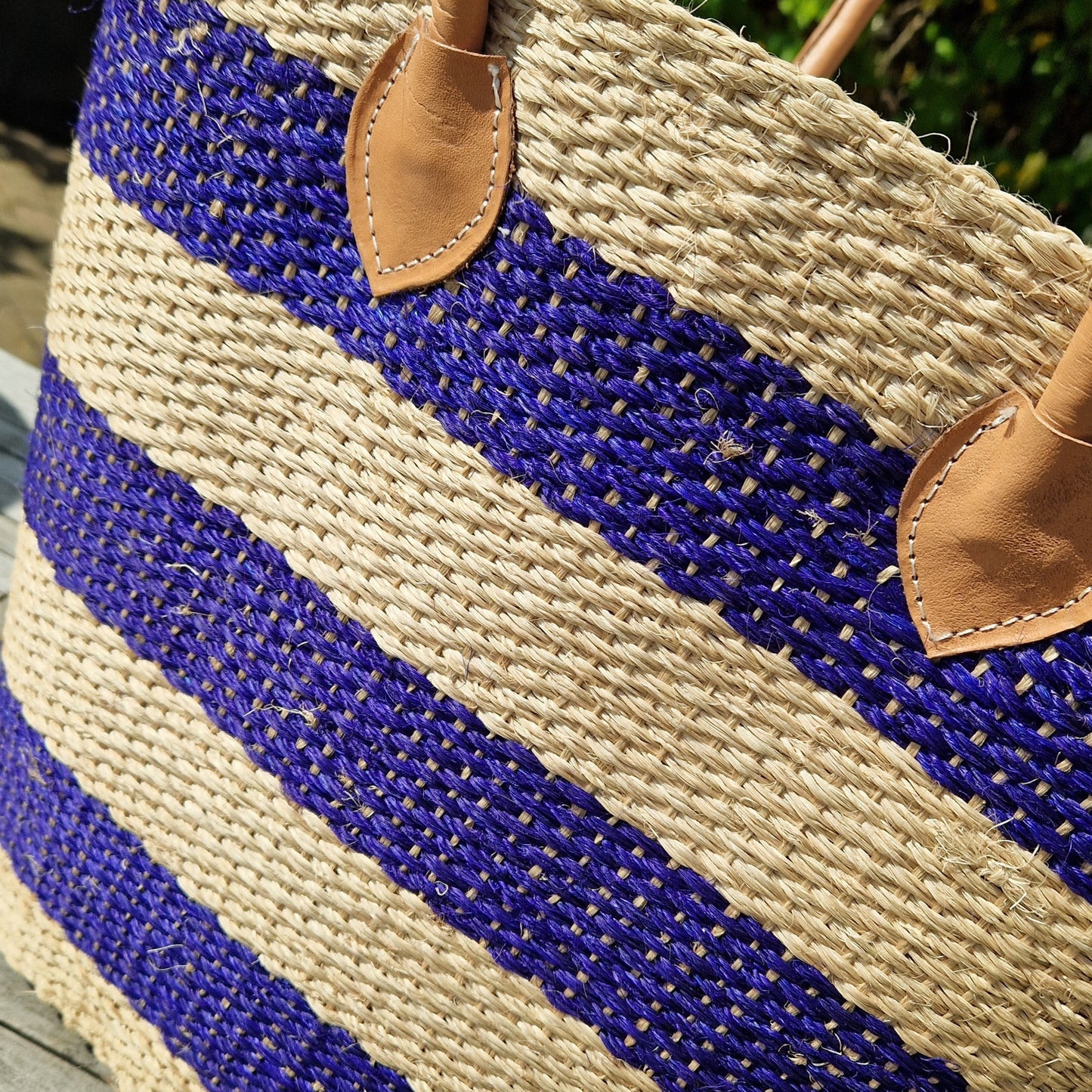 Sisal Basket with a navy stripe nautical look.