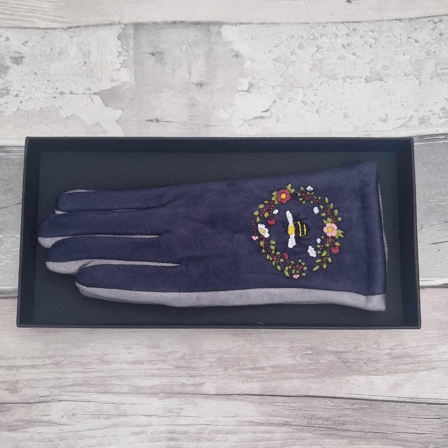Grey and Navy two tone gloves with an embroidered bee design in gift box.