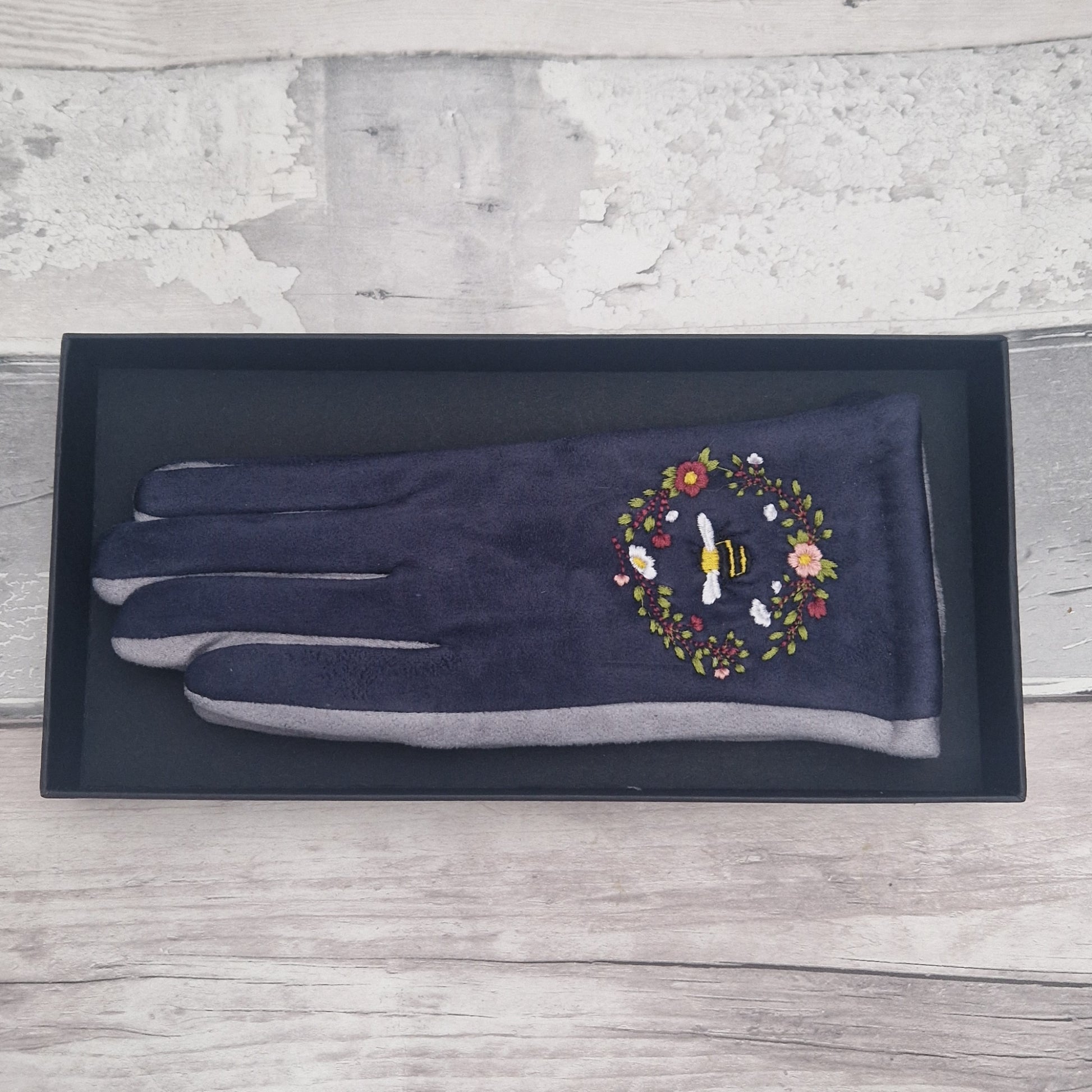 Grey and Navy two tone gloves with an embroidered bee design in gift box.