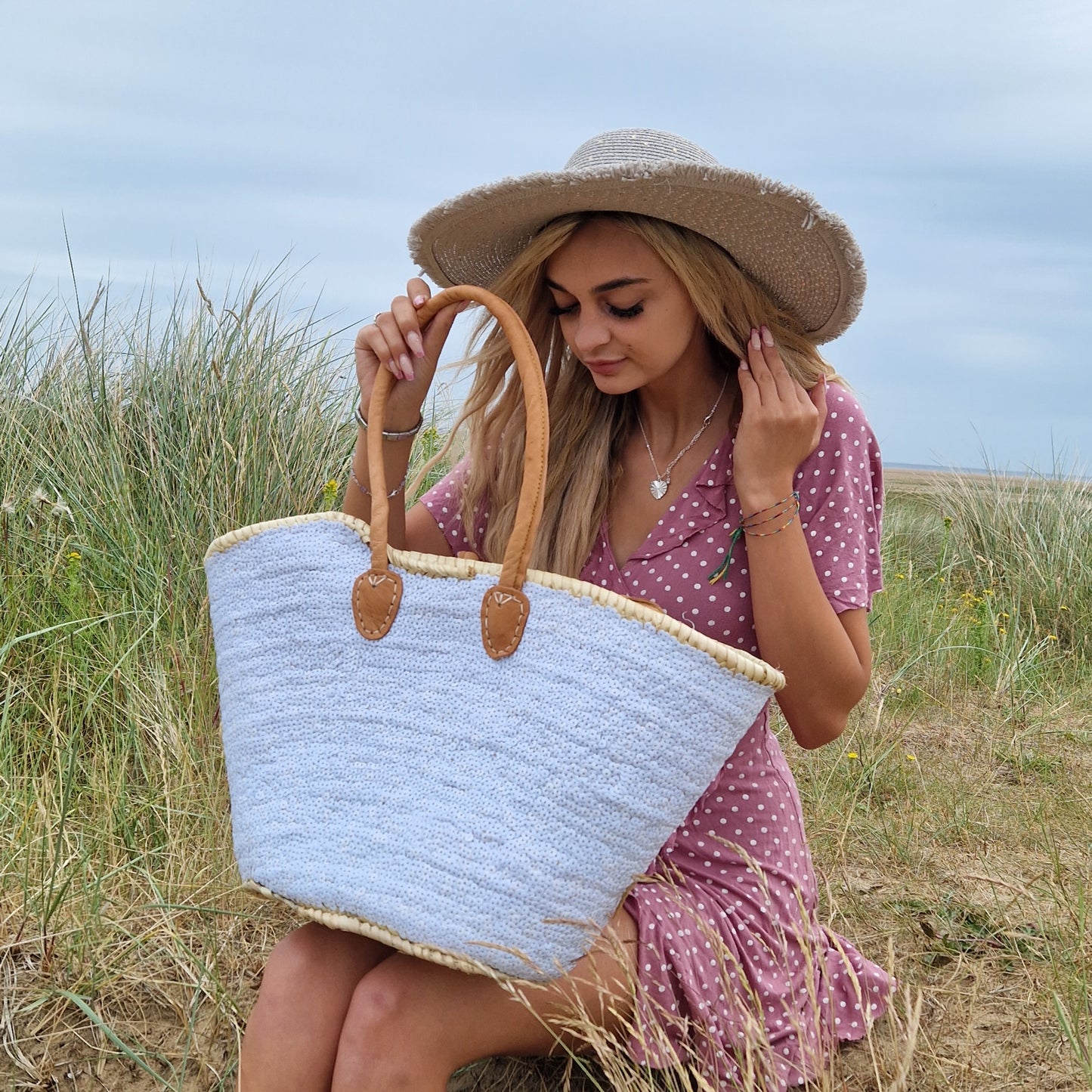 Morrocan hand woven basket with leather handles decorated with white sequins