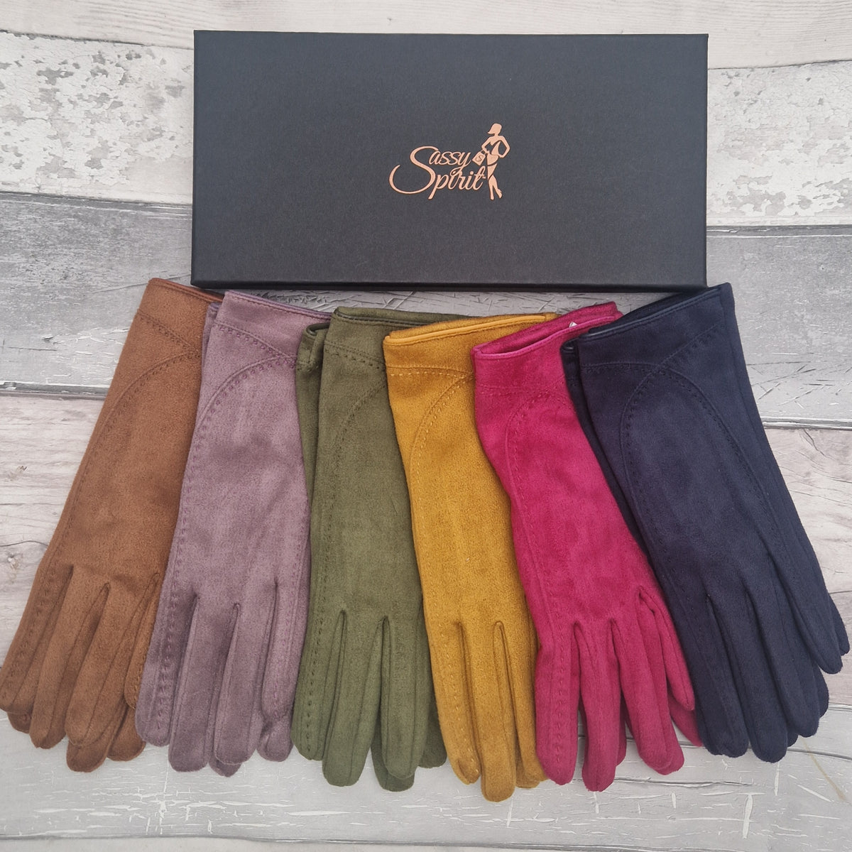 6 Pairs of brightly coloured suede gloves with a Sassy Spirit Gift Box.