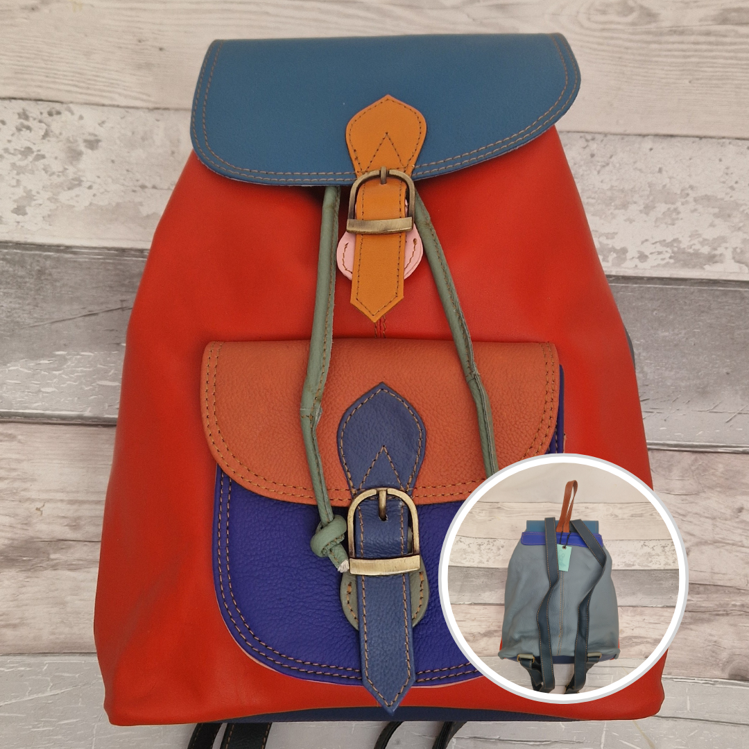 Multicolored backpack made from leather with front pocket and magnetic buckle closers. Deep orange and blue colours.