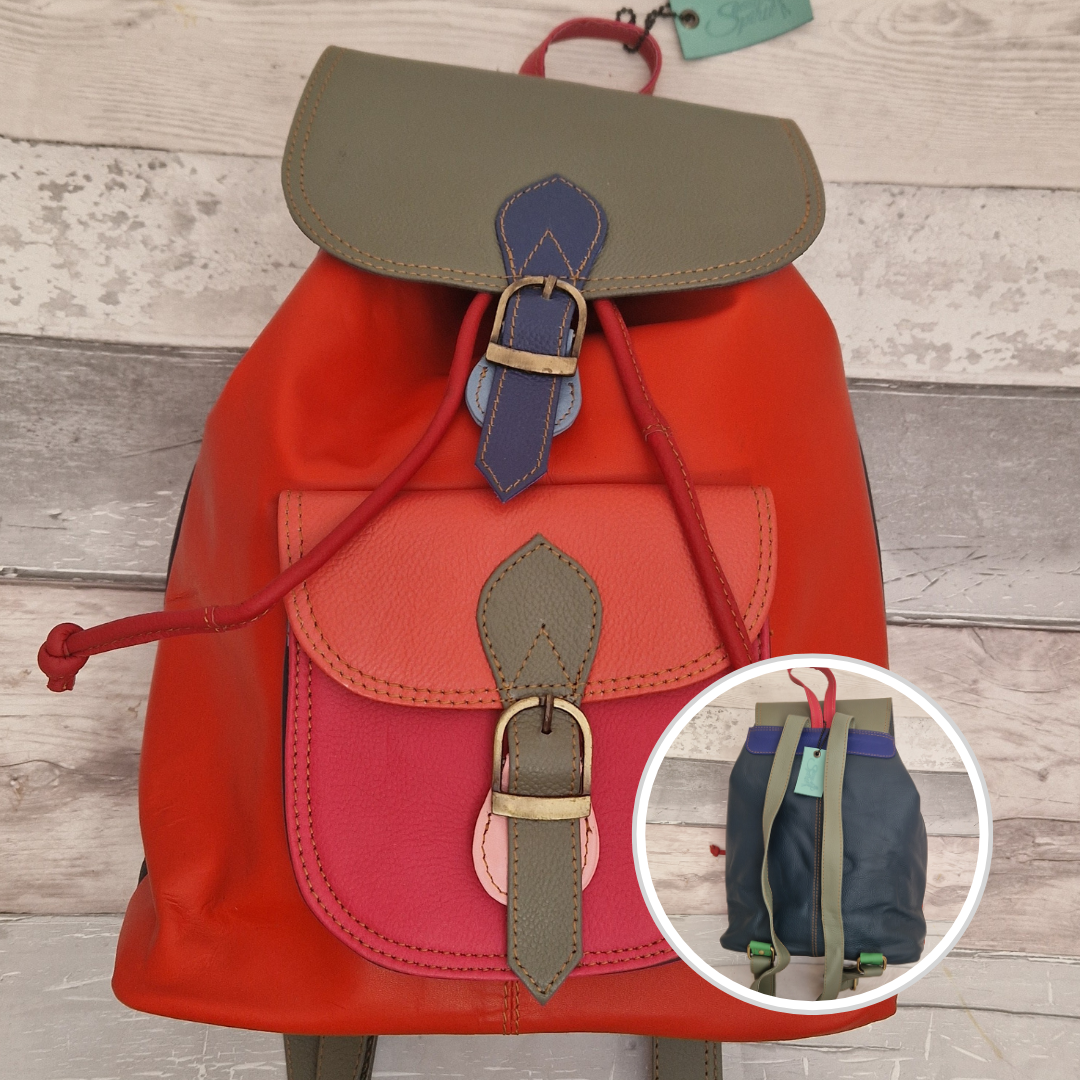 Multicolored backpack made from leather with front pocket and magnetic buckle closers. Deep orange, sage green and pink colours.