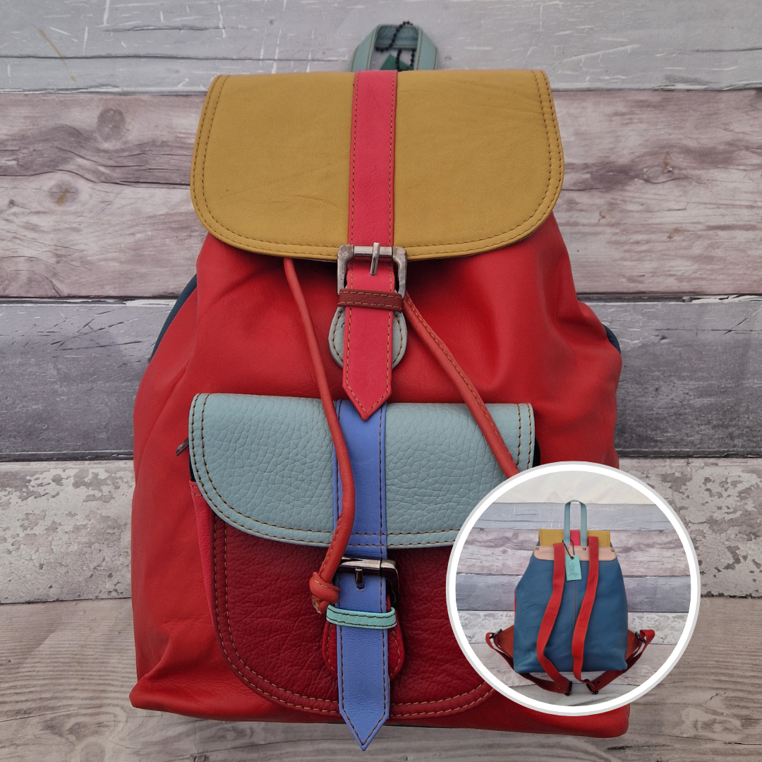 Multicolored backpack made from leather with front pocket and magnetic buckle closers. Sunshine yellow, blue and red colours.