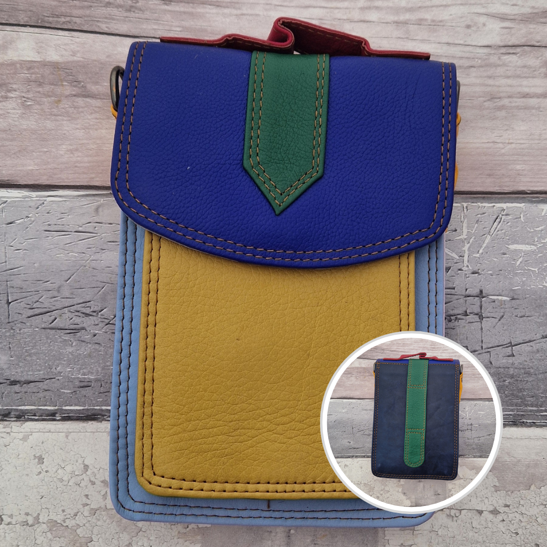 All leather crossbody bag with carry handle made up in a variety of brightly coloured panels.