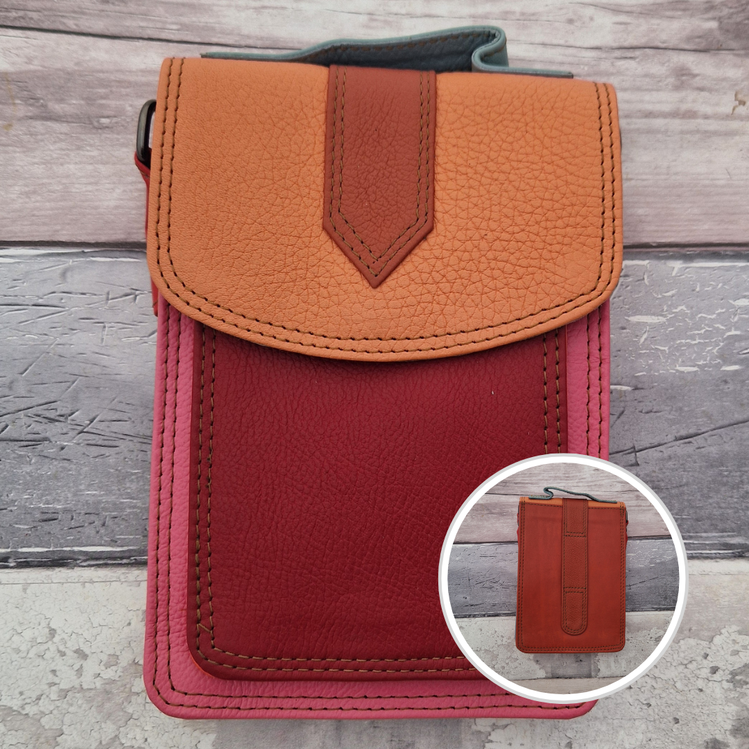 All leather crossbody bag with carry handle made up in a variety of brightly coloured panels.