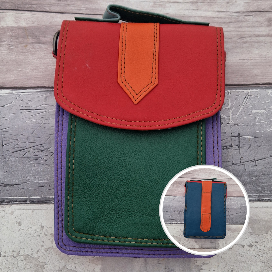 All leather crossbody bag with carry handle made up in a variety of brightly coloured panels.