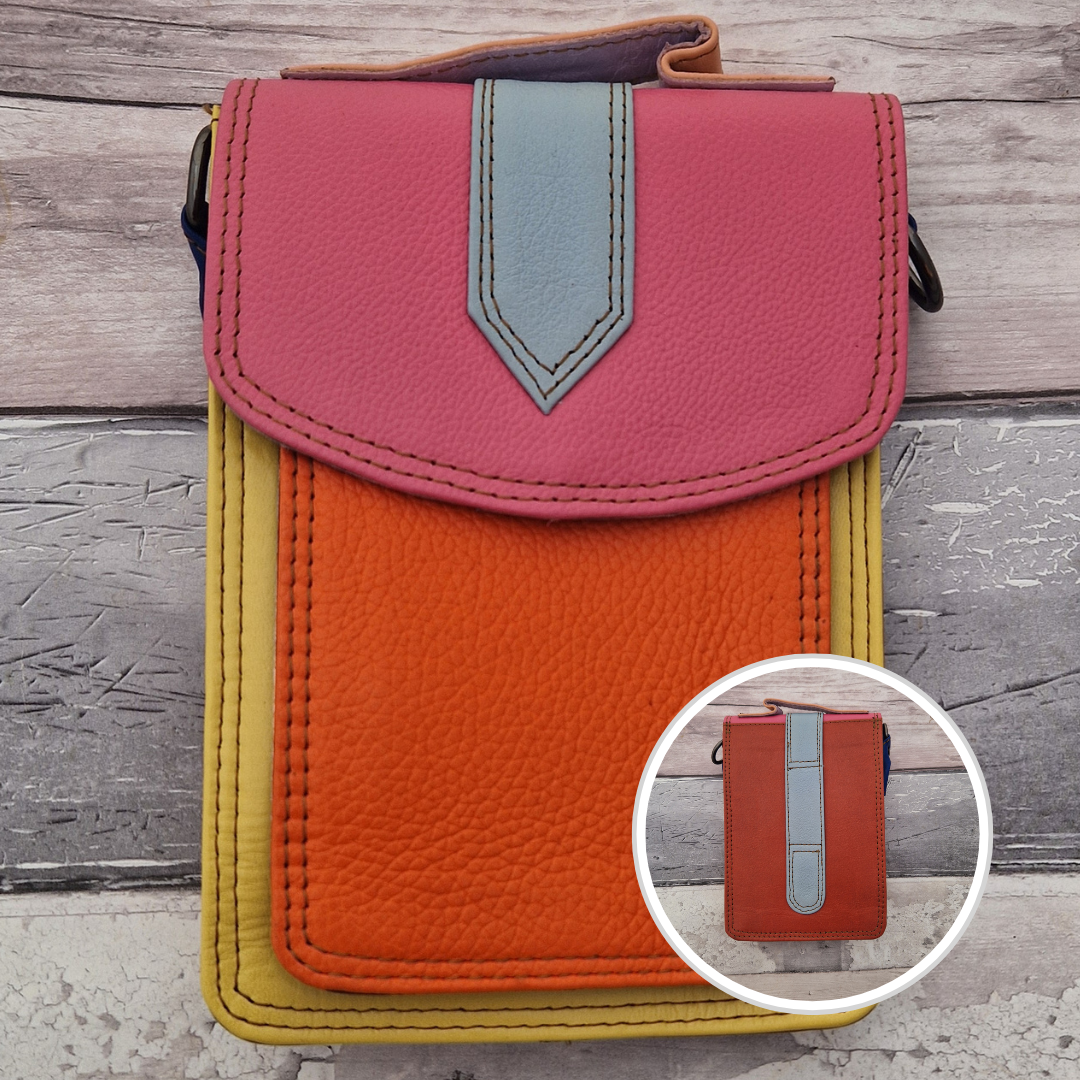 All leather crossbody bag with carry handle made up in a variety of brightly coloured panels.
