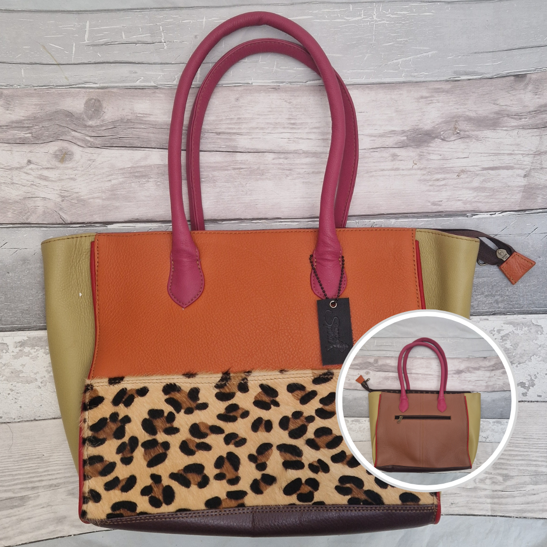 Long handled ladies handbag made from brightly coloured leather off-cuts with a textured panel of Leopard print.