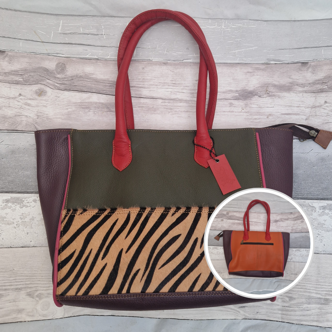 Long handled ladies handbag made from brightly coloured leather off-cuts with a textured panel of Zebra print.