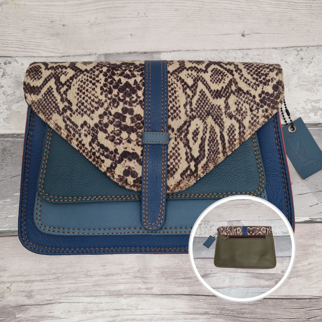Rectangular shaped envelope crossbody bag made from leather off-cuts. Shades of blue coloured panels are finished with a striking snake print textured panel.