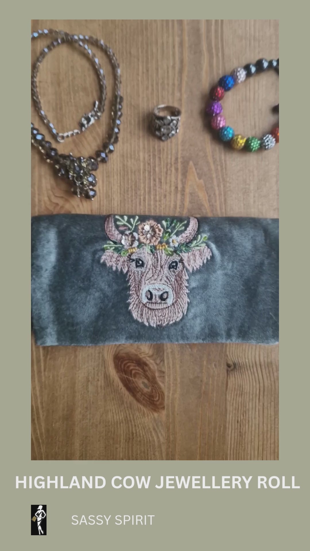 Velvet Jewellery Roll decorated with a hand embroidered image of a Highland Cow.