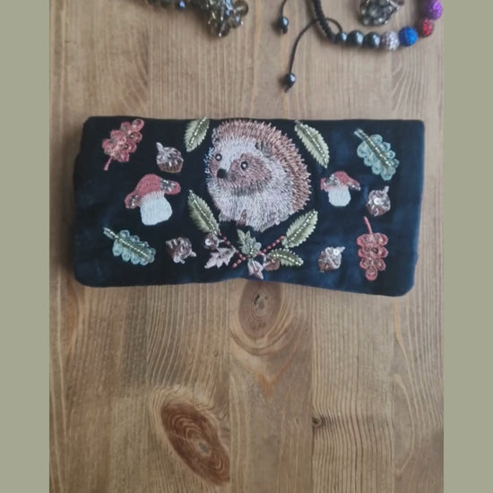 Velvet Jewellery Roll decorated with a hand embroidered image of a woodland hedgehog