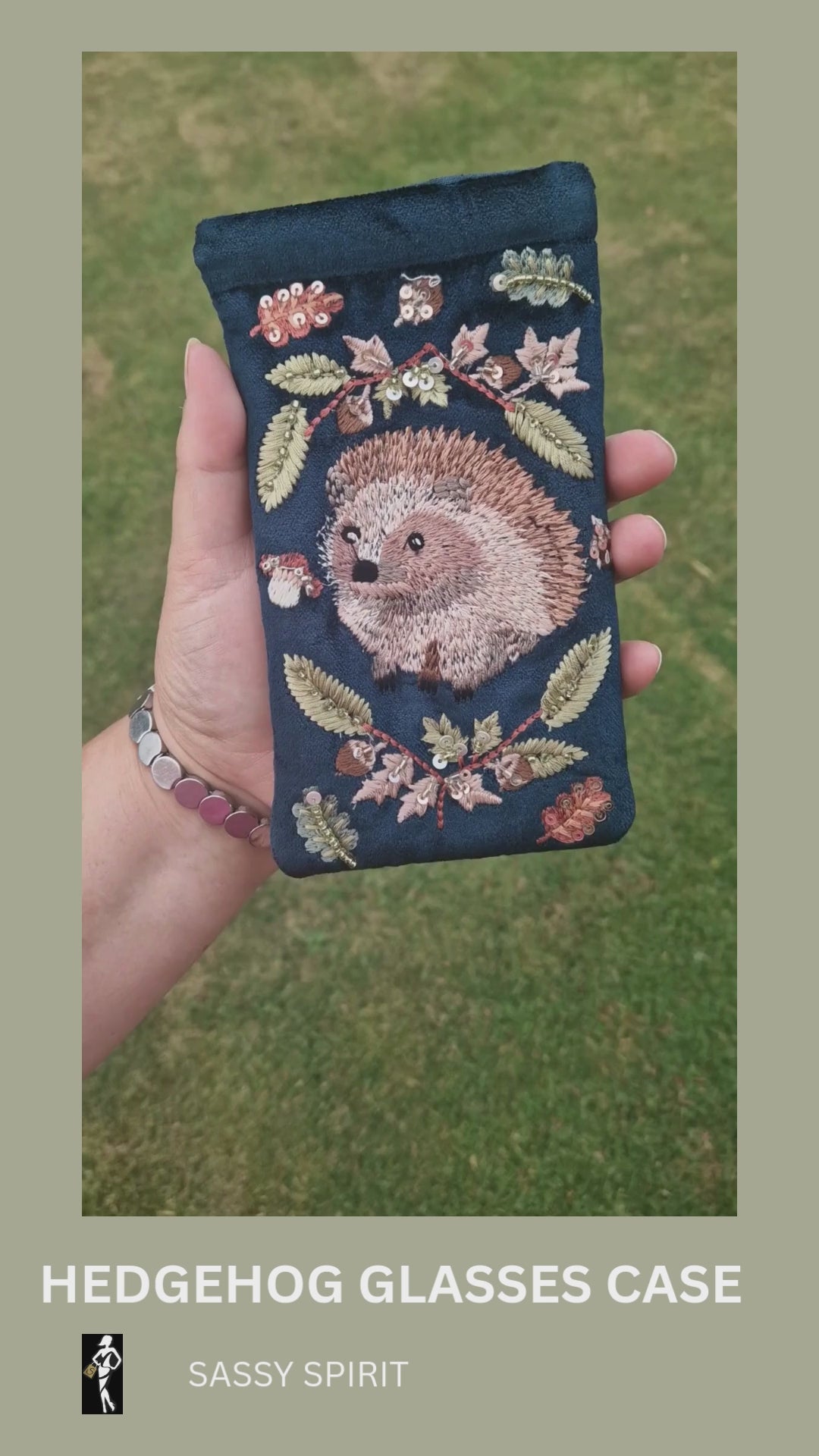 Navy velvet glasses case decorated with an embroidered Hedgehog woodland scene. Finished with beads and sequins.