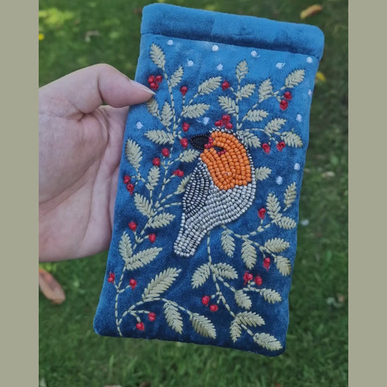 Dusky Blue Velvet Glasses Pouch decorated with an embroidery and bead design featuring a Robin surrounded by festive holly.