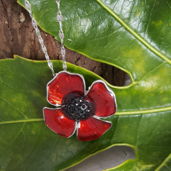 Poppy pendant necklace with black diamante centre